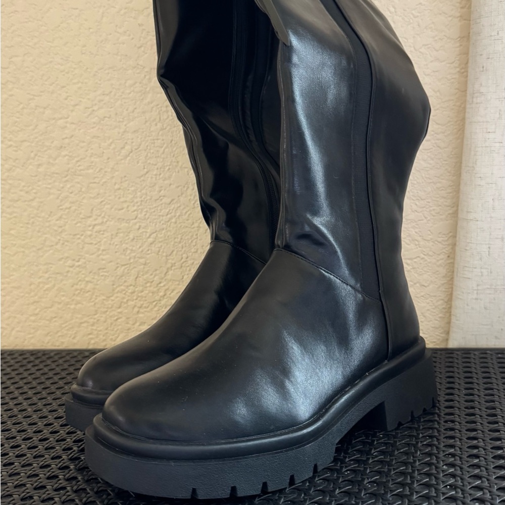 Tall Black Boots with Rugged Soles